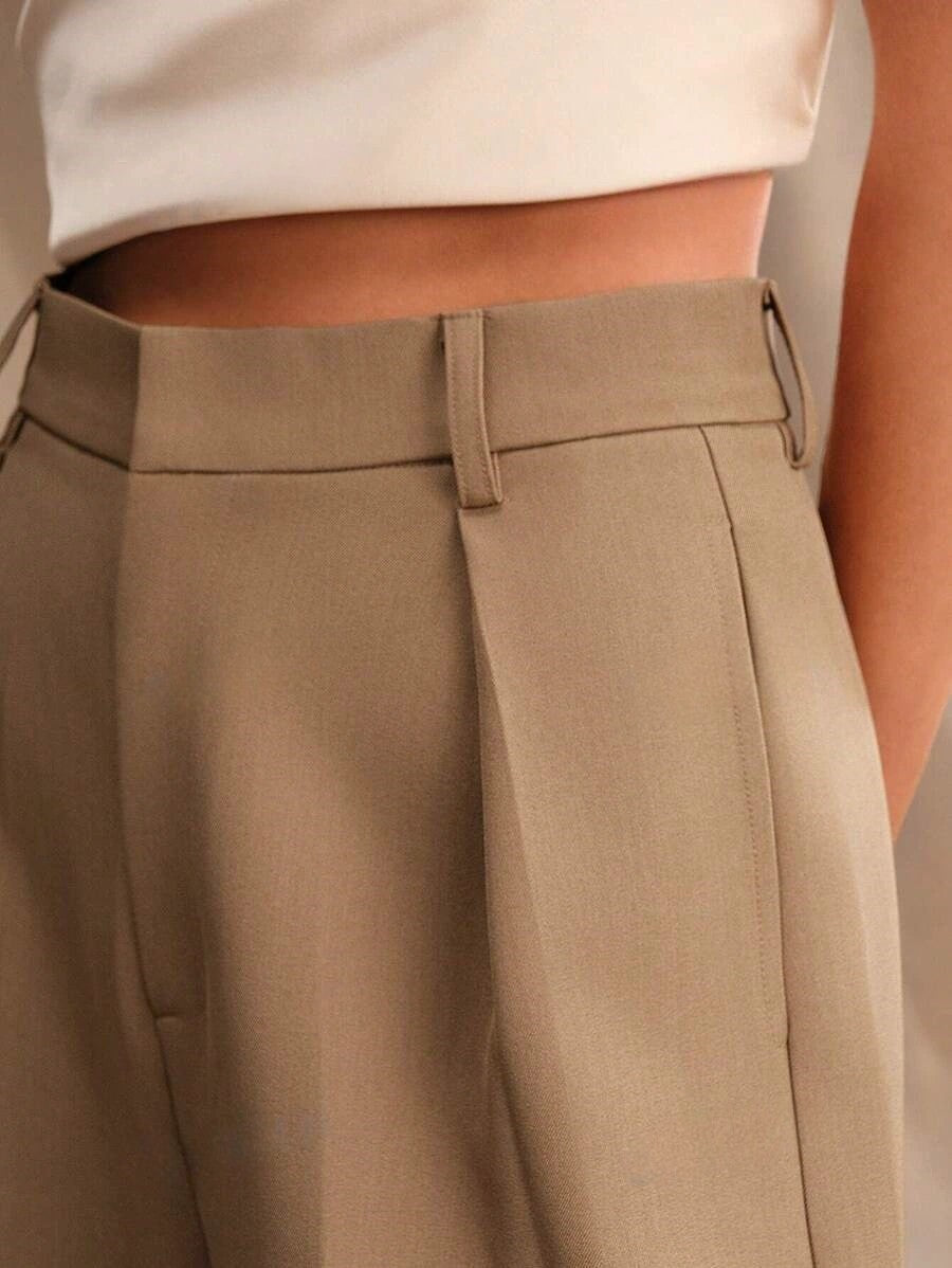 High waist trousers in a crisp white, ideal for business attire.