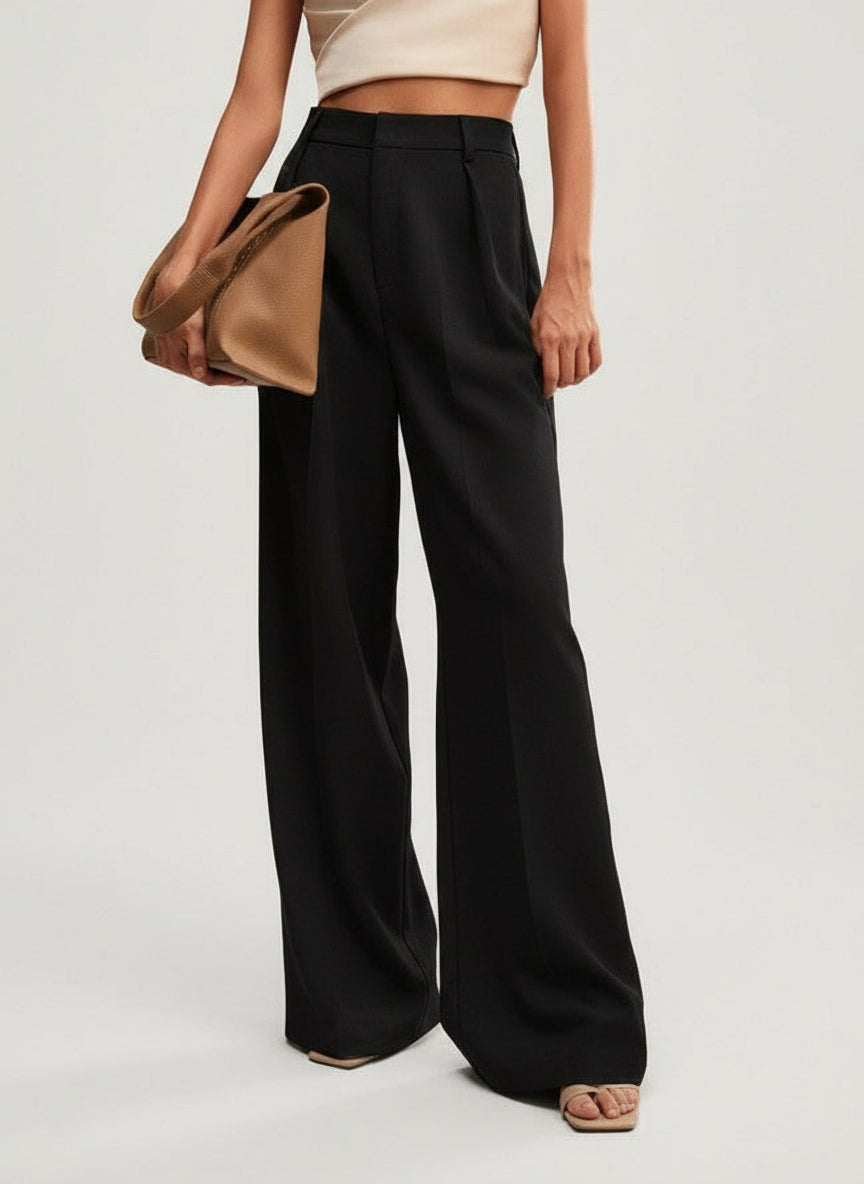 Stylish tailored trousers in a muted blue, featuring a wide leg.
