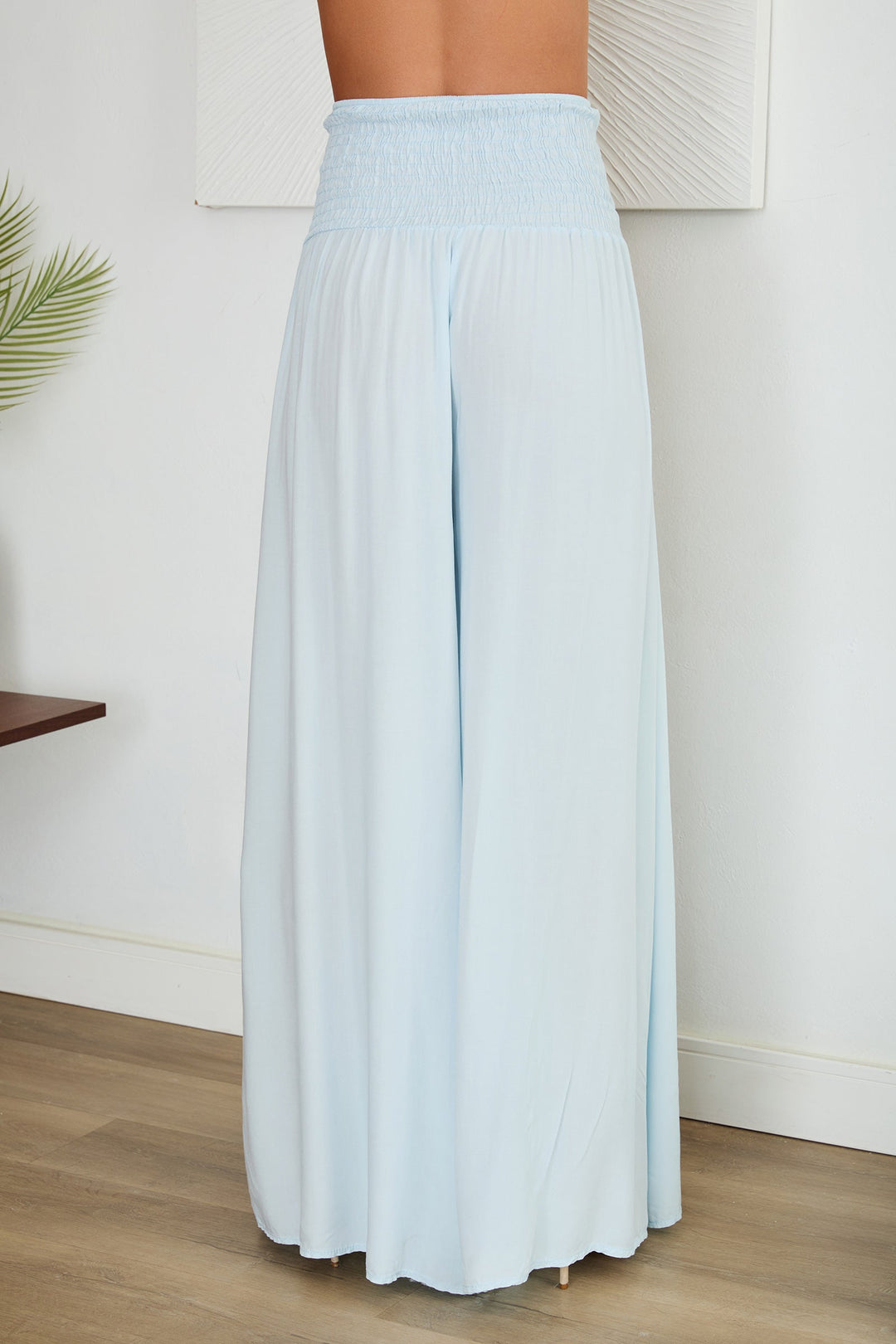 Italian fashion women's high-waist wide leg viscose trousers, effortless elegance.