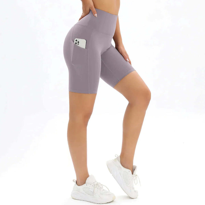 Women's high-waisted fitness shorts featuring a practical pocket for everyday activewear.