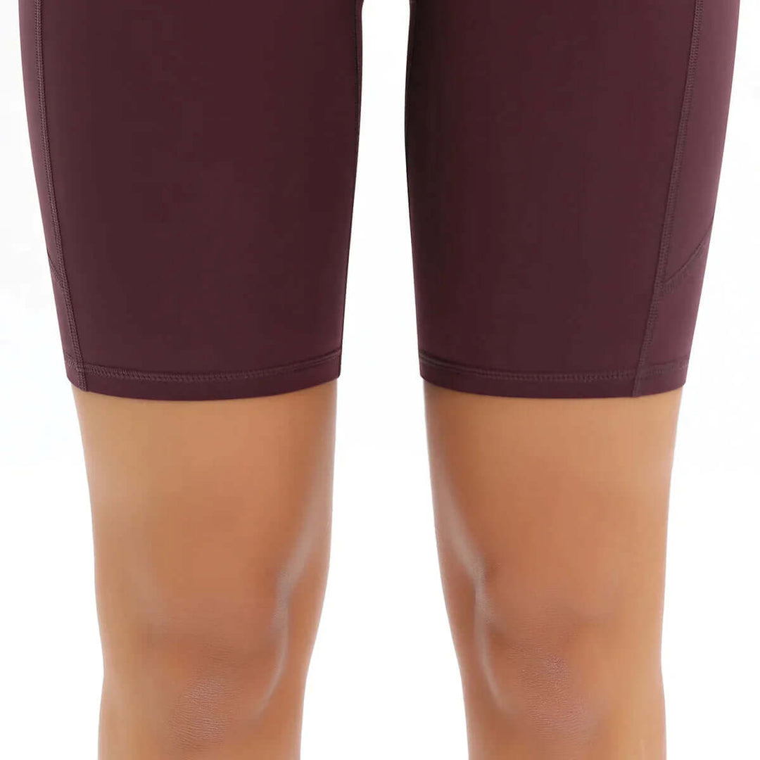 Essential women's high-waisted active shorts with a pocket, perfect for any workout & sportswear.