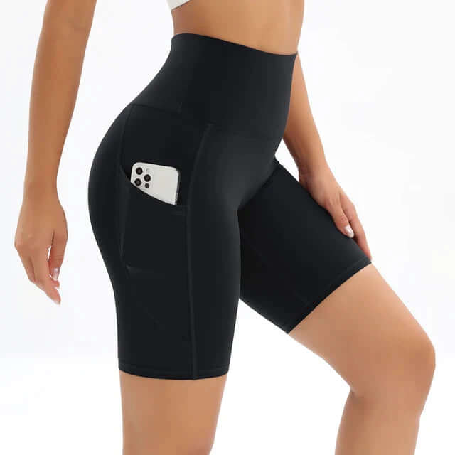 High-waisted workout shorts for women featuring a convenient side pocket, ideal for activewear.