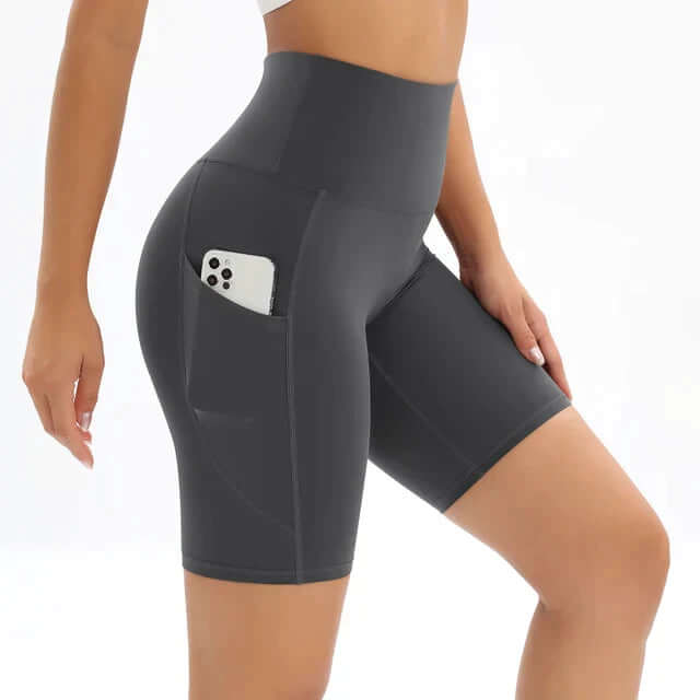 Durable women's high-waisted fitness shorts with a pocket, perfect for gym wear, yoga & running.