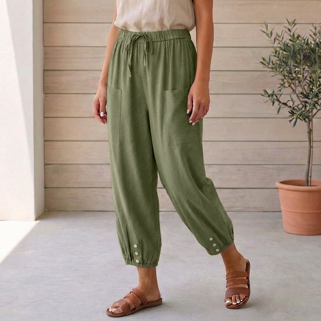 Versatile khaki high-waisted cropped pants offering a relaxed fit and modern gathered ankles.