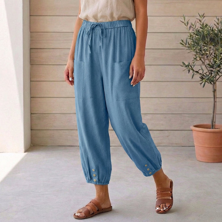 Comfortable and fashionable army green women's cropped pants with a high waist and gathered ankle design.