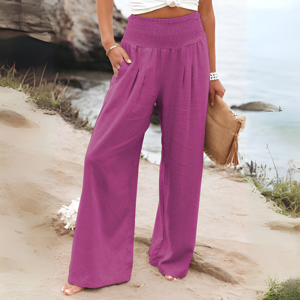 Women's high-waisted relaxed fit trousers in a light fabric, perfect for casual summer style.