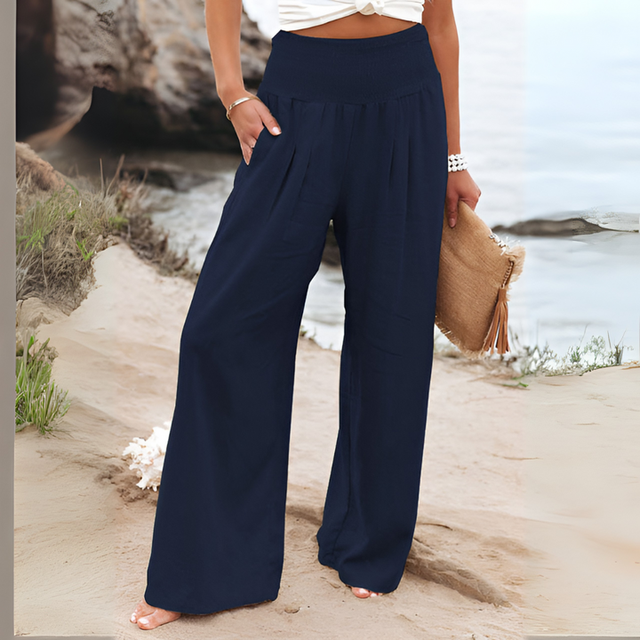 Versatile women's relaxed fit trousers, high-waisted design for a comfortable, elegant look.