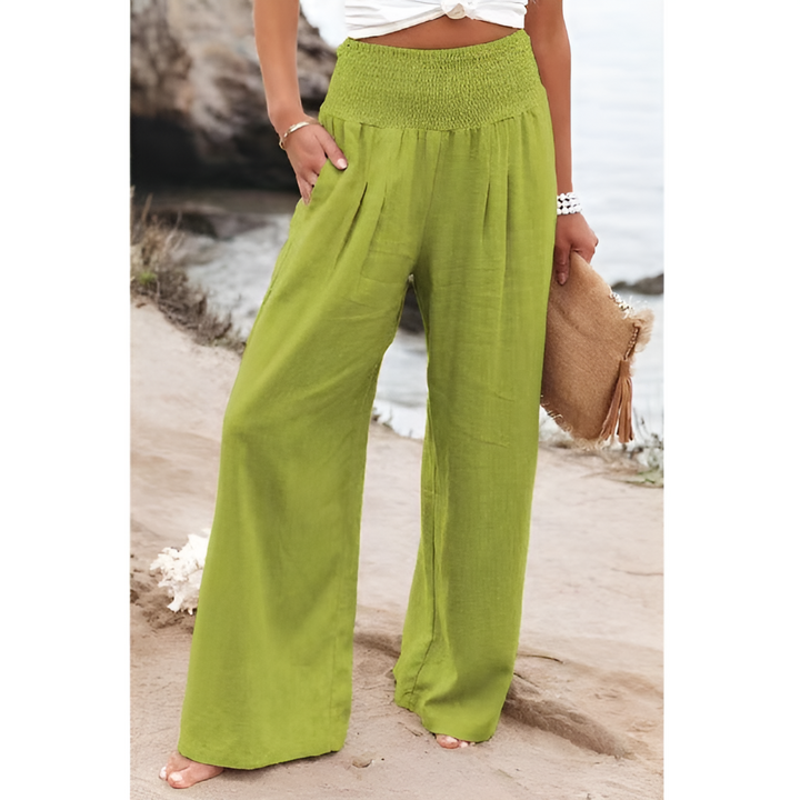 Stylish high-waisted women's trousers with a relaxed fit, great for summer fashion.
