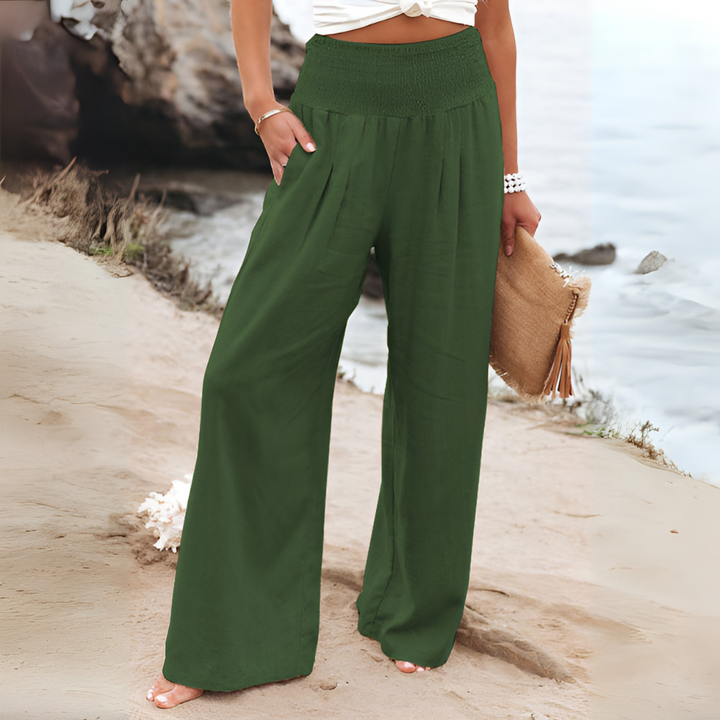 Effortless women's relaxed fit trousers, high-waisted for casual chic and comfort.