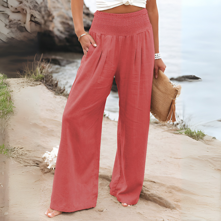 Modern women's high-waisted relaxed fit trousers, perfect for spring/summer versatile styling.