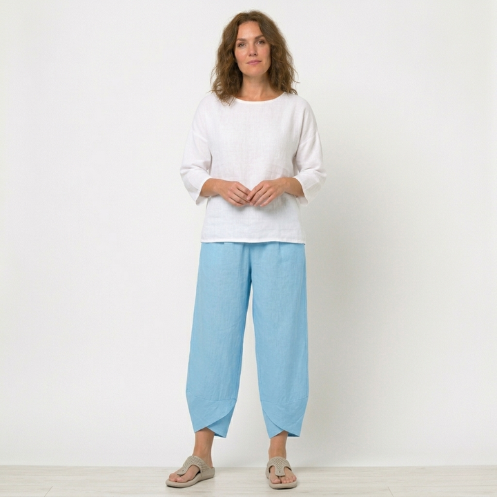Chic women's tulip hem trousers, high-waisted and versatile for holiday or elegant casual wear.