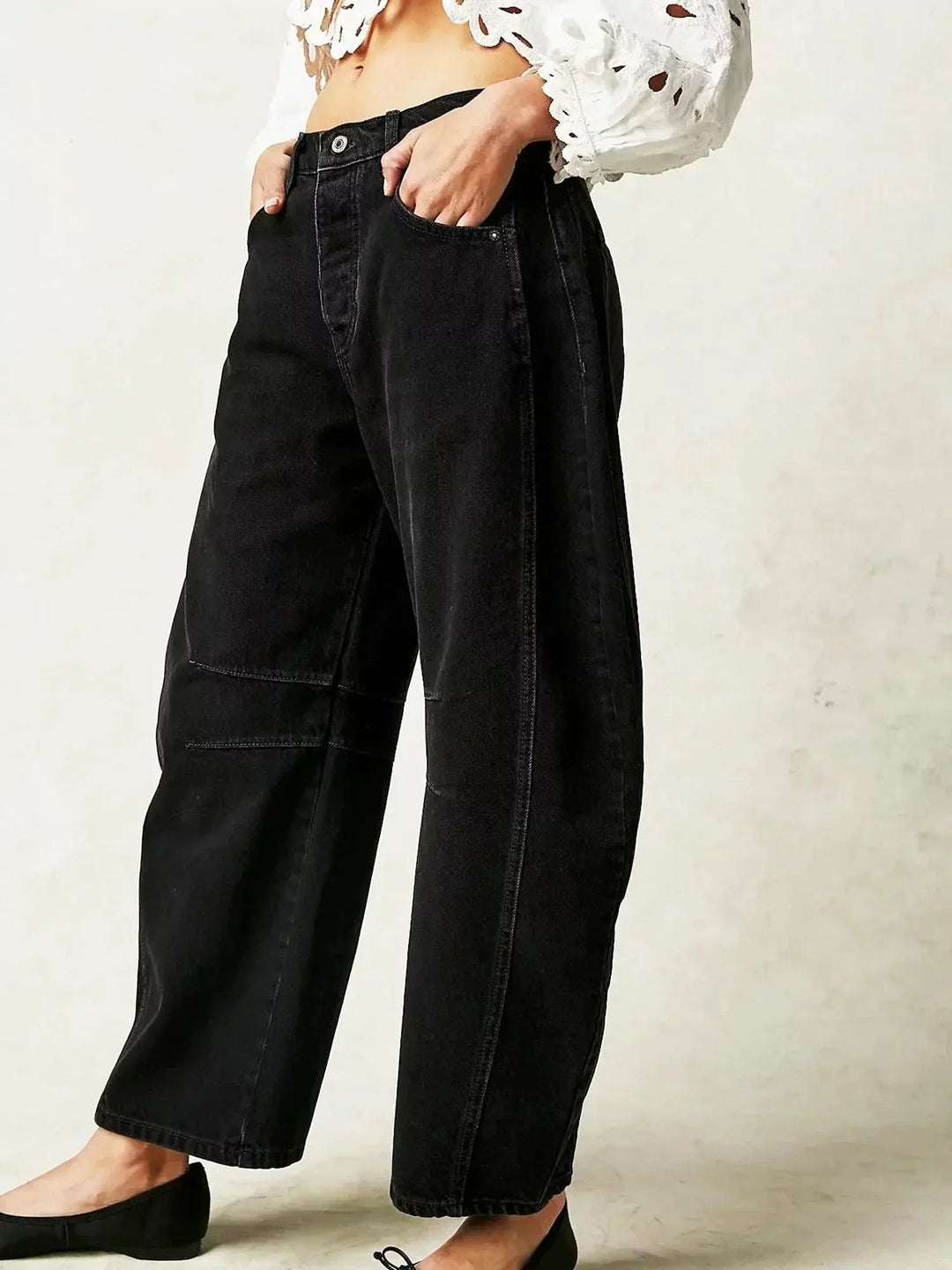 Stylish women's animal print wide-leg jeans with a flattering high waist, perfect for a fashion-forward look.