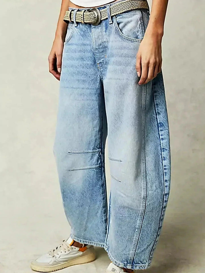 Chic women's wide-leg high-waisted animal print jeans, a bold statement piece for fashion enthusiasts.