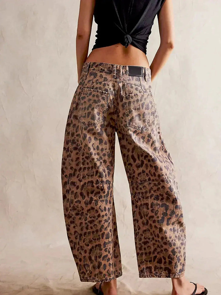 Casual chic women's animal print jeans, high-waisted with a wide leg, for a comfortable and stylish look.