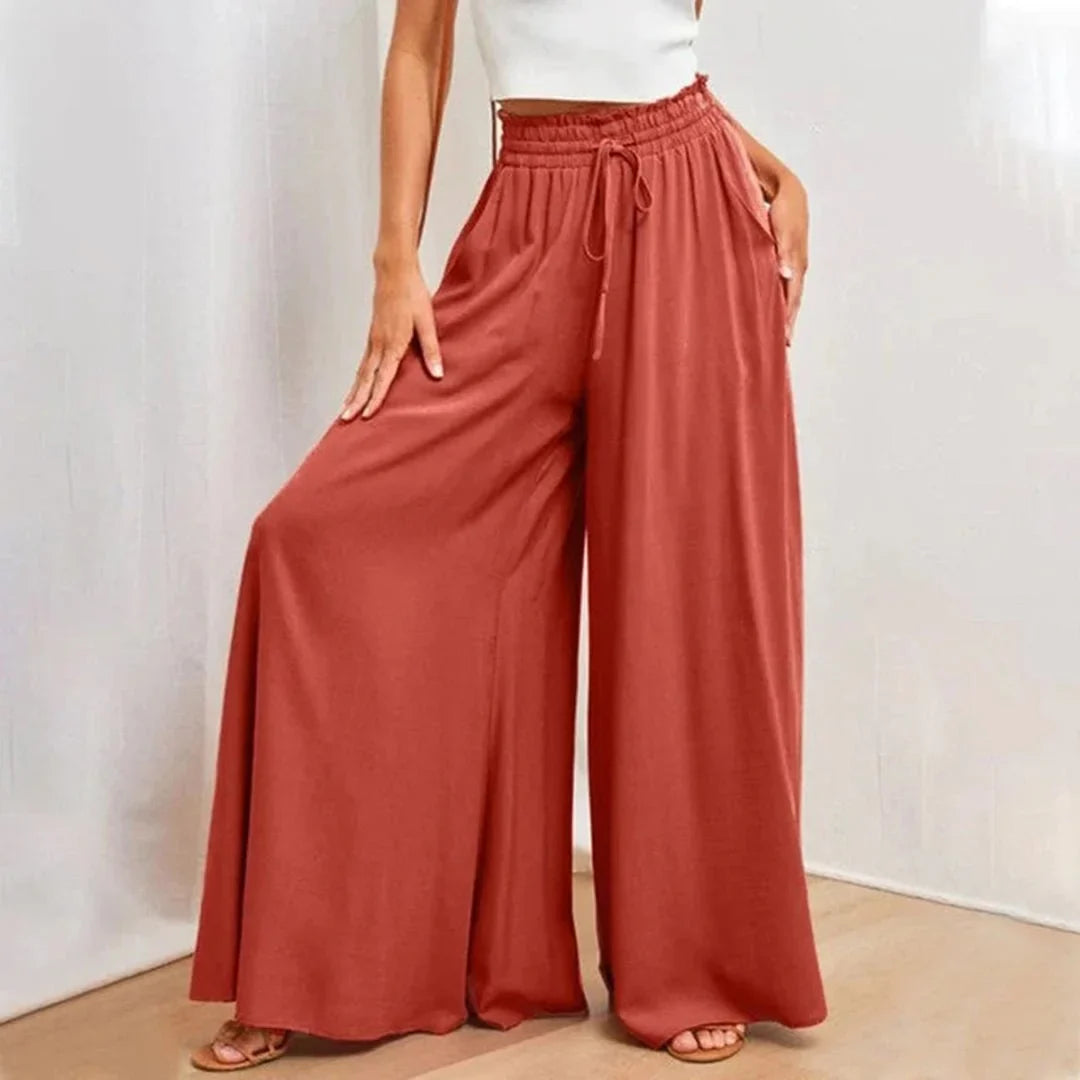 Versatile women's wide leg pants, high-waisted & smocked drawstring for comfortable, stylish casual outfits.