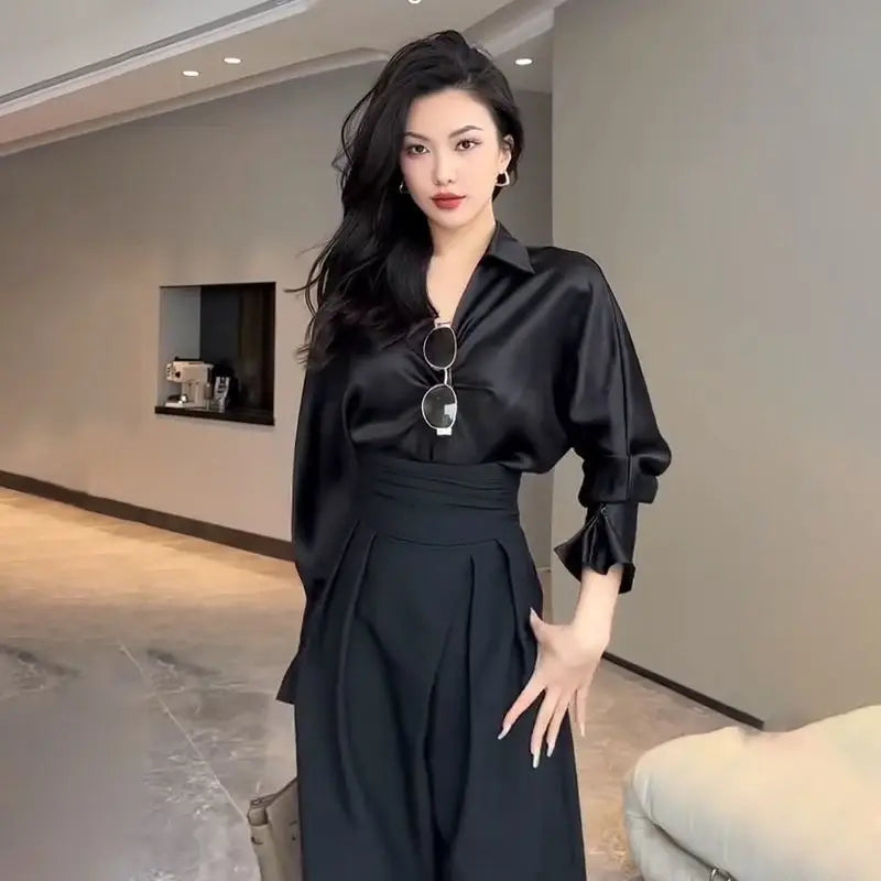 Versatile women's elegant wide-leg trousers, high-waisted with a contemporary crossed waist for offices & events.