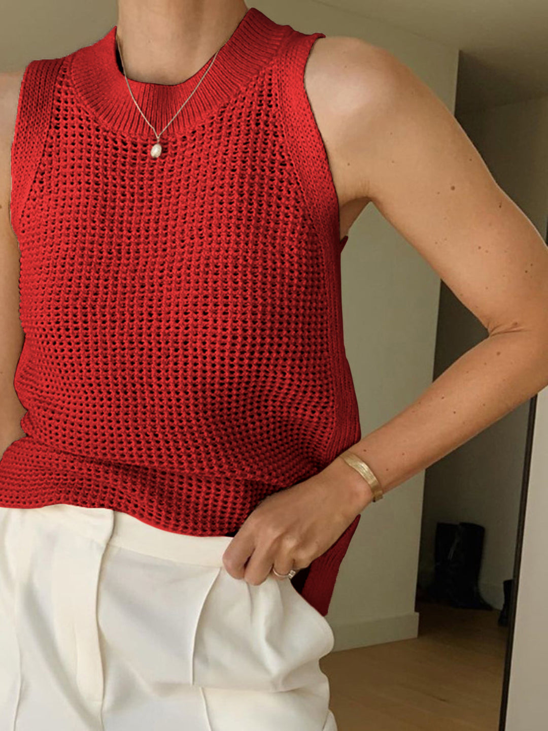Elegant summer fashion tank top for women, with a chic hollow design for a stylish casual look.