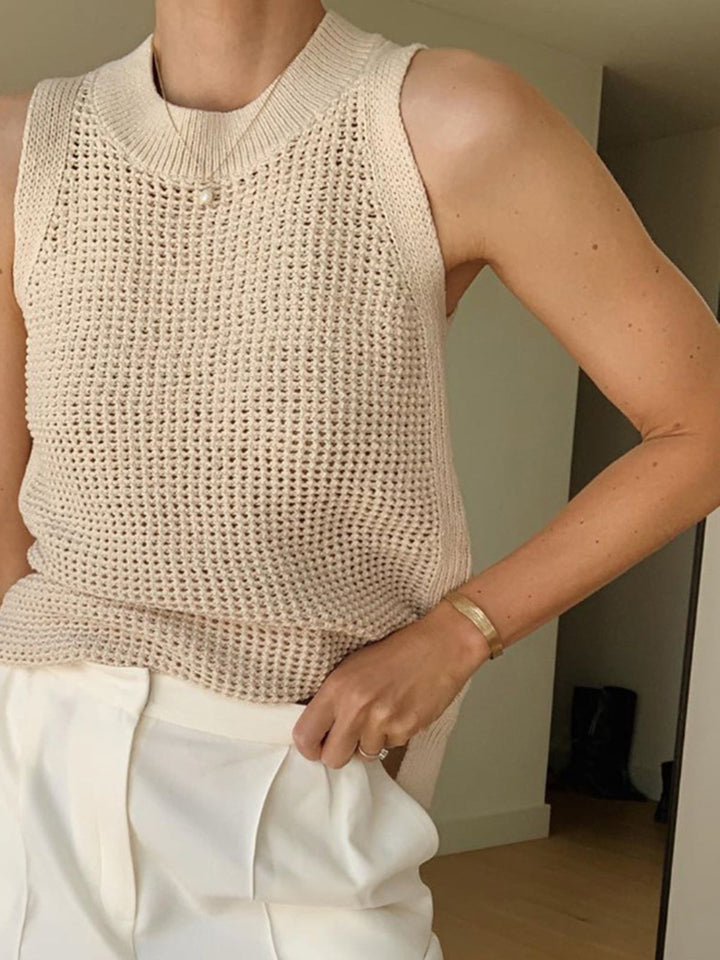 Comfortable women's sleeveless top, featuring an elegant hollow design for a breezy and versatile look.