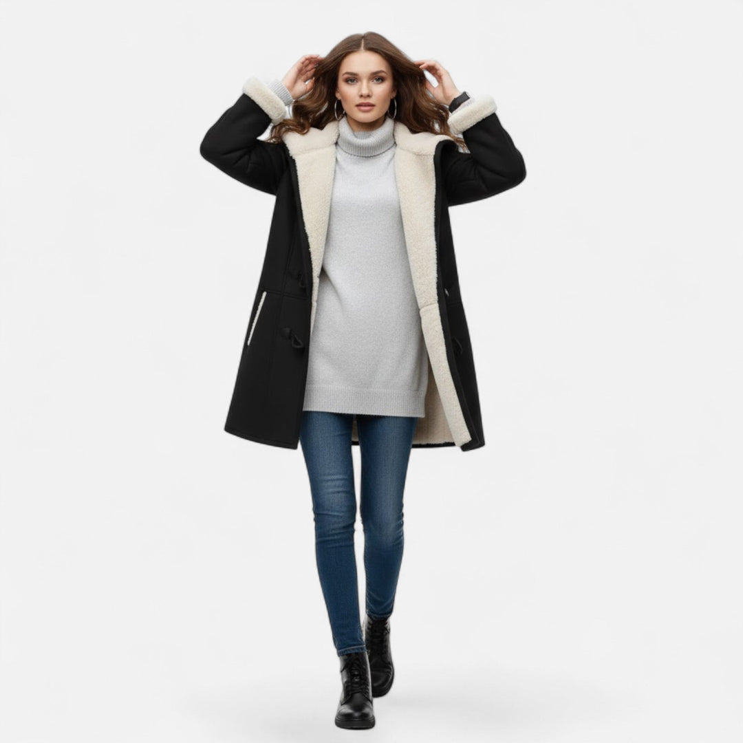 Women's essential fall fashion: a comfortable and stylish hooded coat.