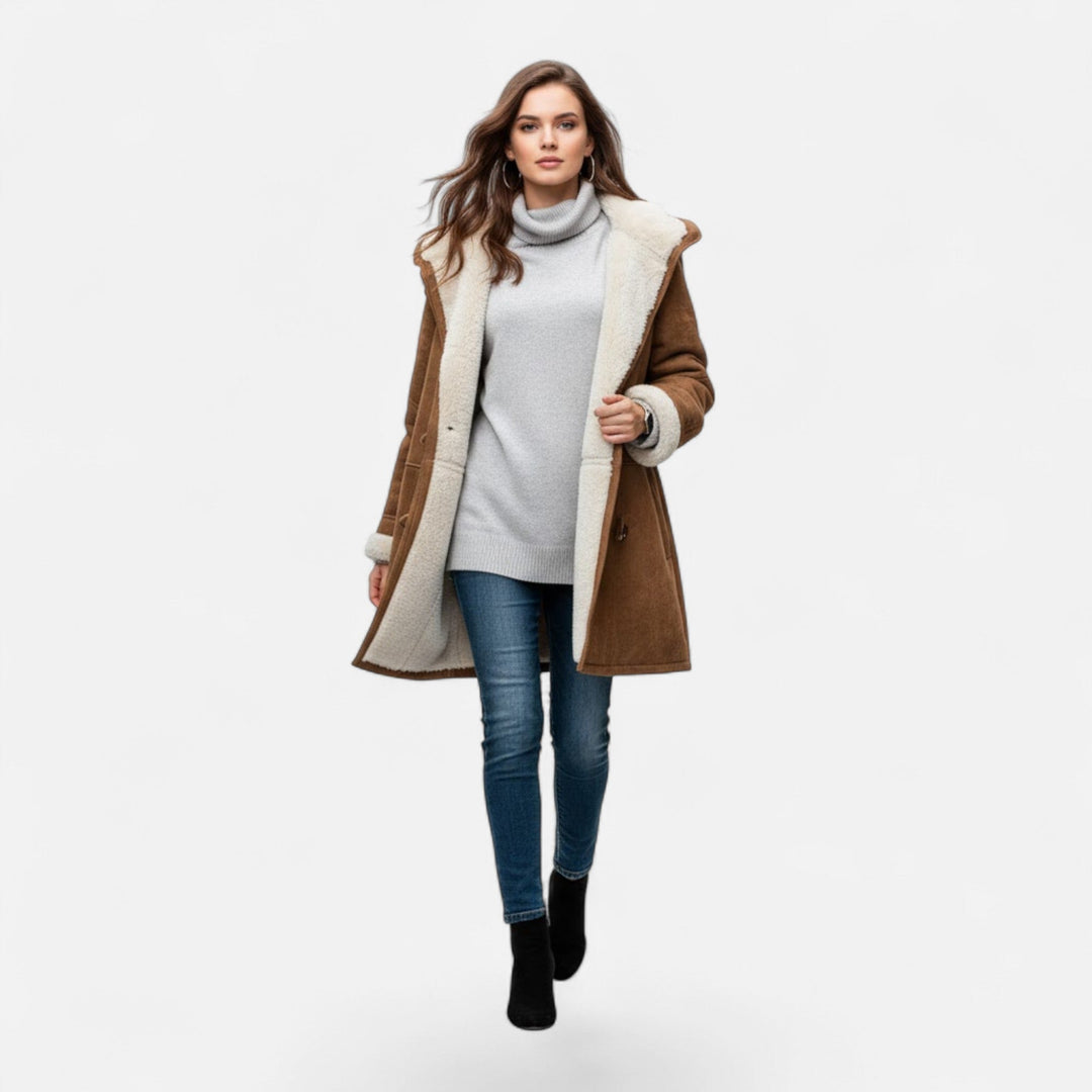 Focus on the pocket design of this women's hooded winter coat.
