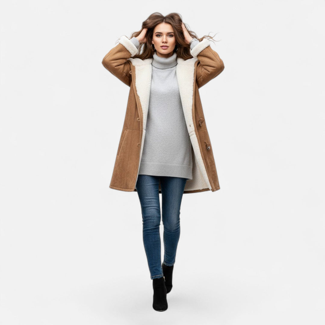 Shop the latest women's fashion: a practical and chic hooded button-front coat.