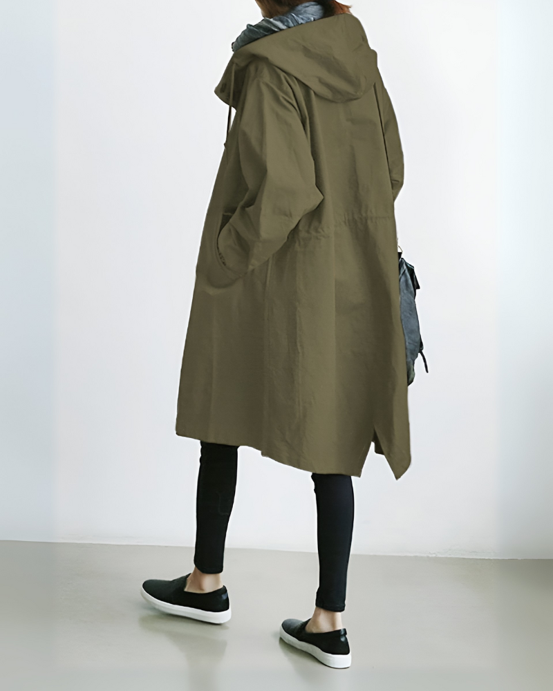 Front view of a stylish women's hooded trench coat in navy blue