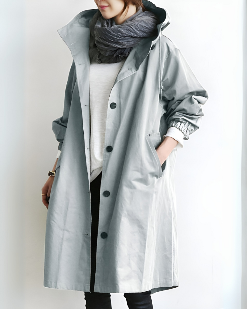 Model wearing a versatile women's trench coat, perfect for autumn