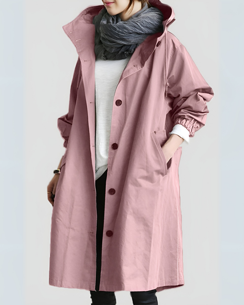 Detail of the buttons and belt on a women's classic outerwear trench coat
