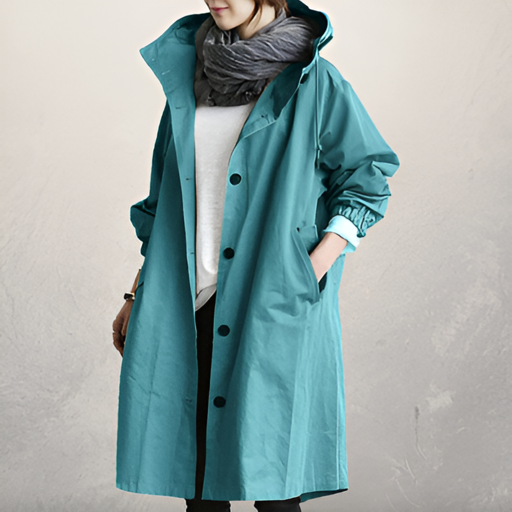 Elegant women's trench coat with hood, showcasing timeless design