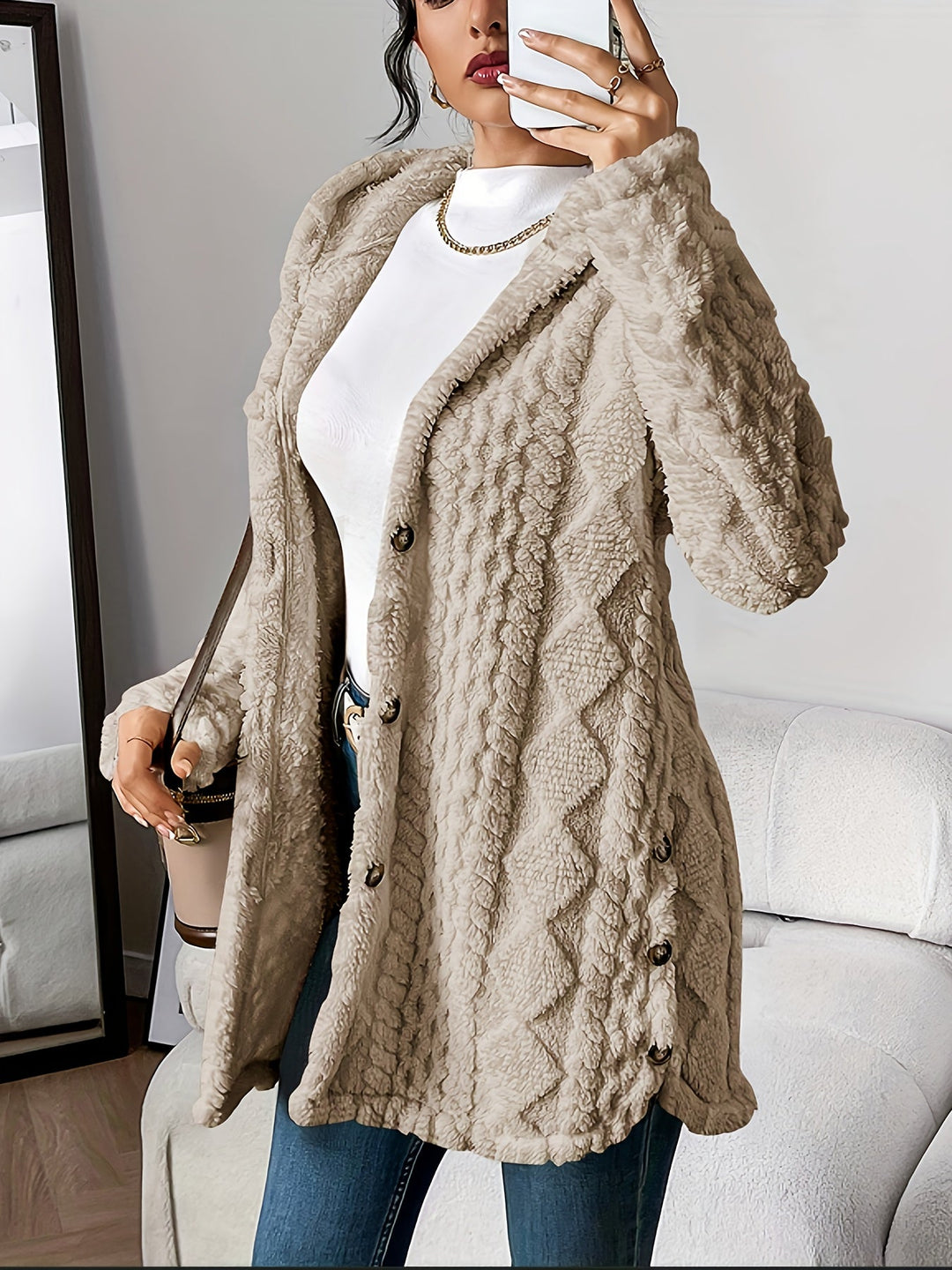 Women's longline hooded cardigan. Cozy textured knit, button front, perfect casual sweater for cold weather.