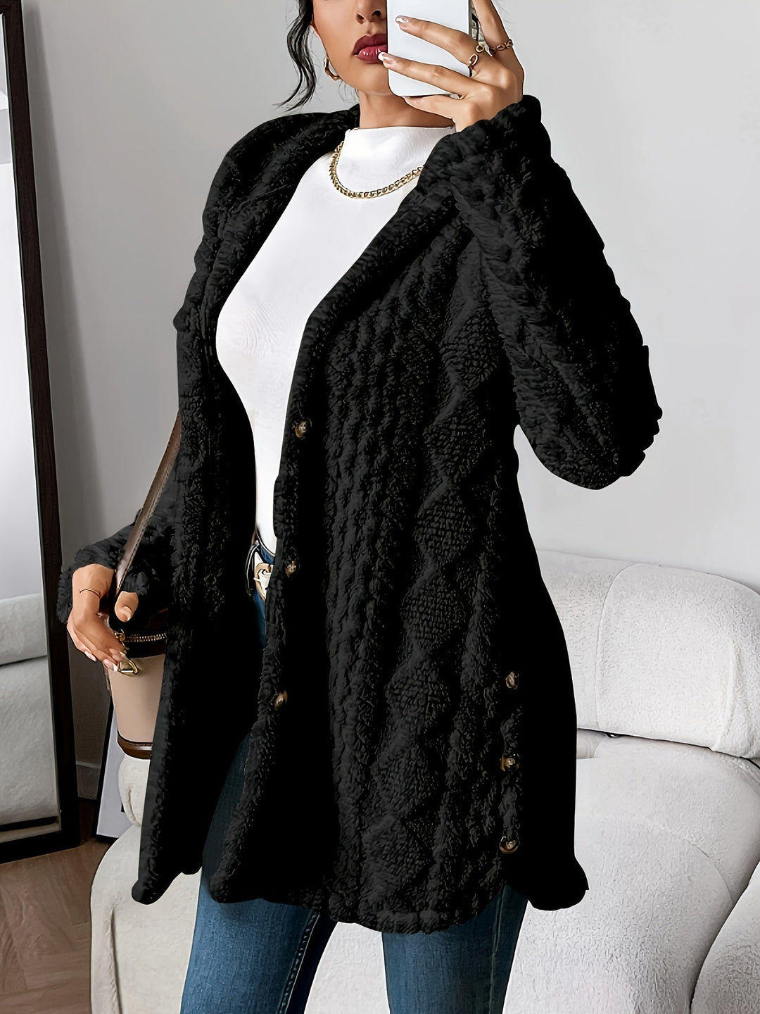 Versatile women's longline hooded cardigan. Casual sweater with button front, a cozy layer for winter fashion.