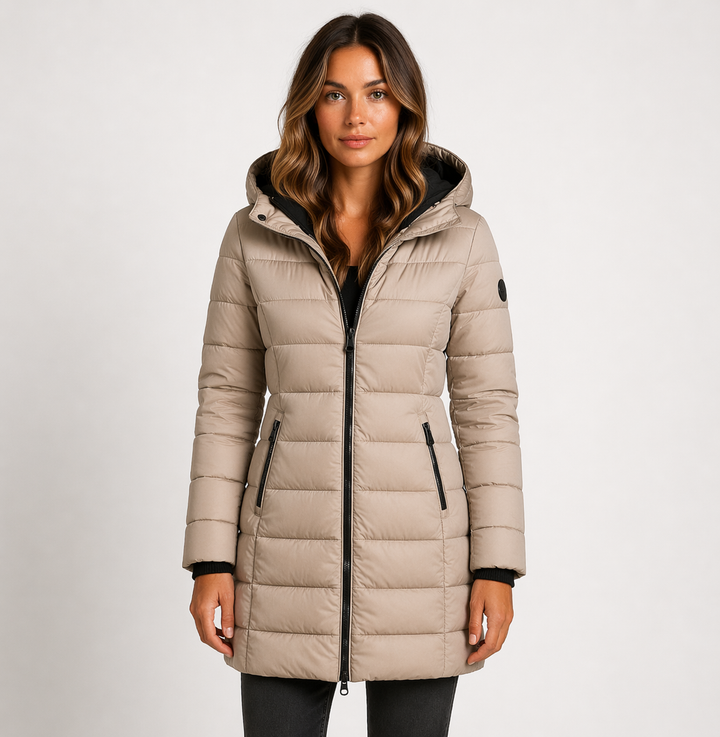 Cozy women's hooded puffer jacket, essential warm outerwear for cold weather & winter activities.