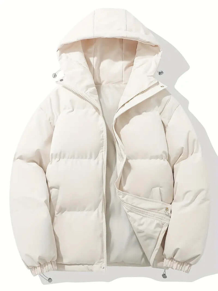 Trendy women's hooded puffer jacket, combining warmth and modern winter fashion.