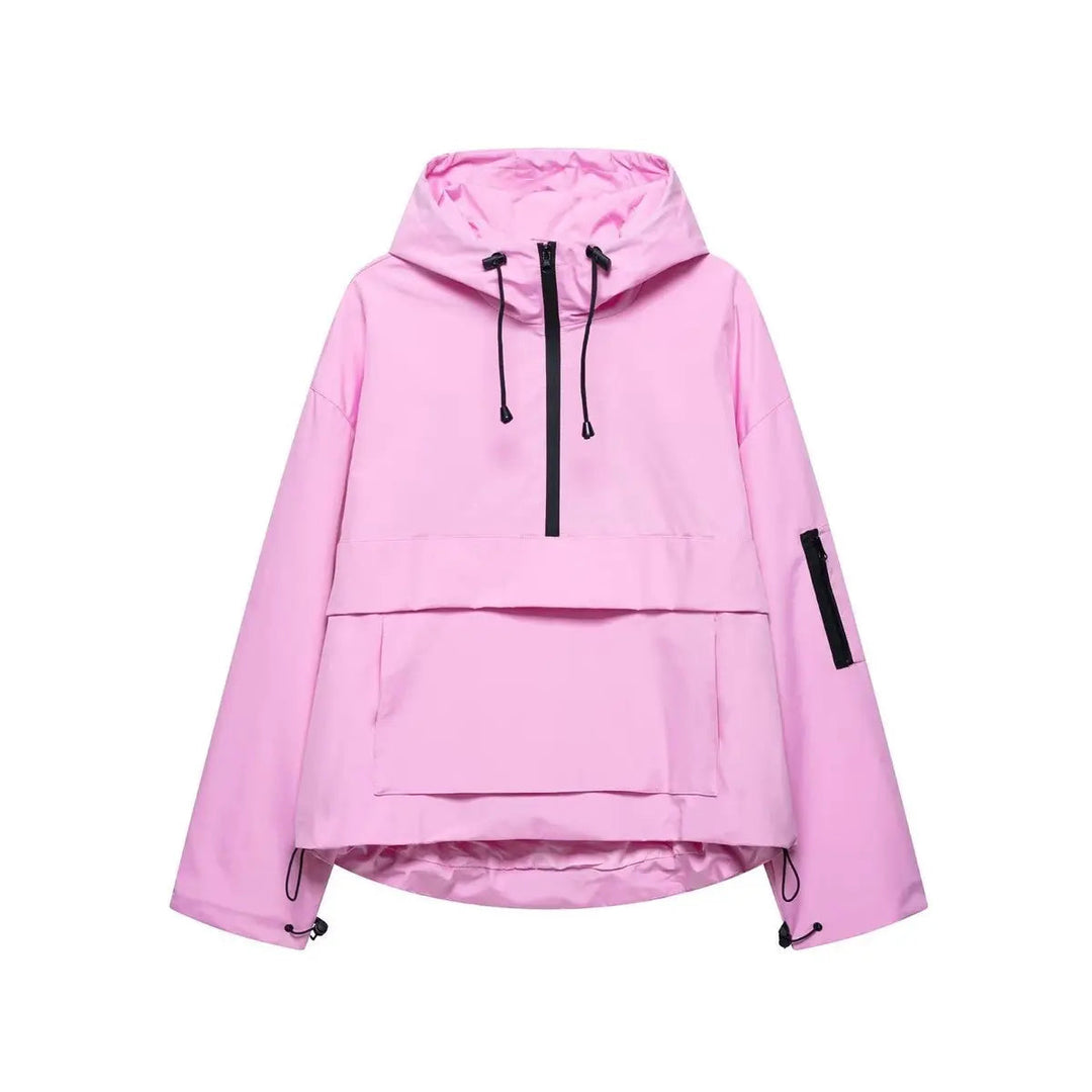 Women's hooded quilted anorak pullover jacket in black. Windproof, half-zip outerwear for fall & spring activewear.