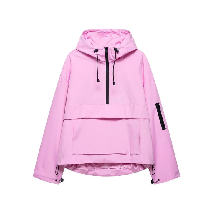 Women's hooded quilted anorak pullover jacket in black. Windproof, half-zip outerwear for fall & spring activewear.