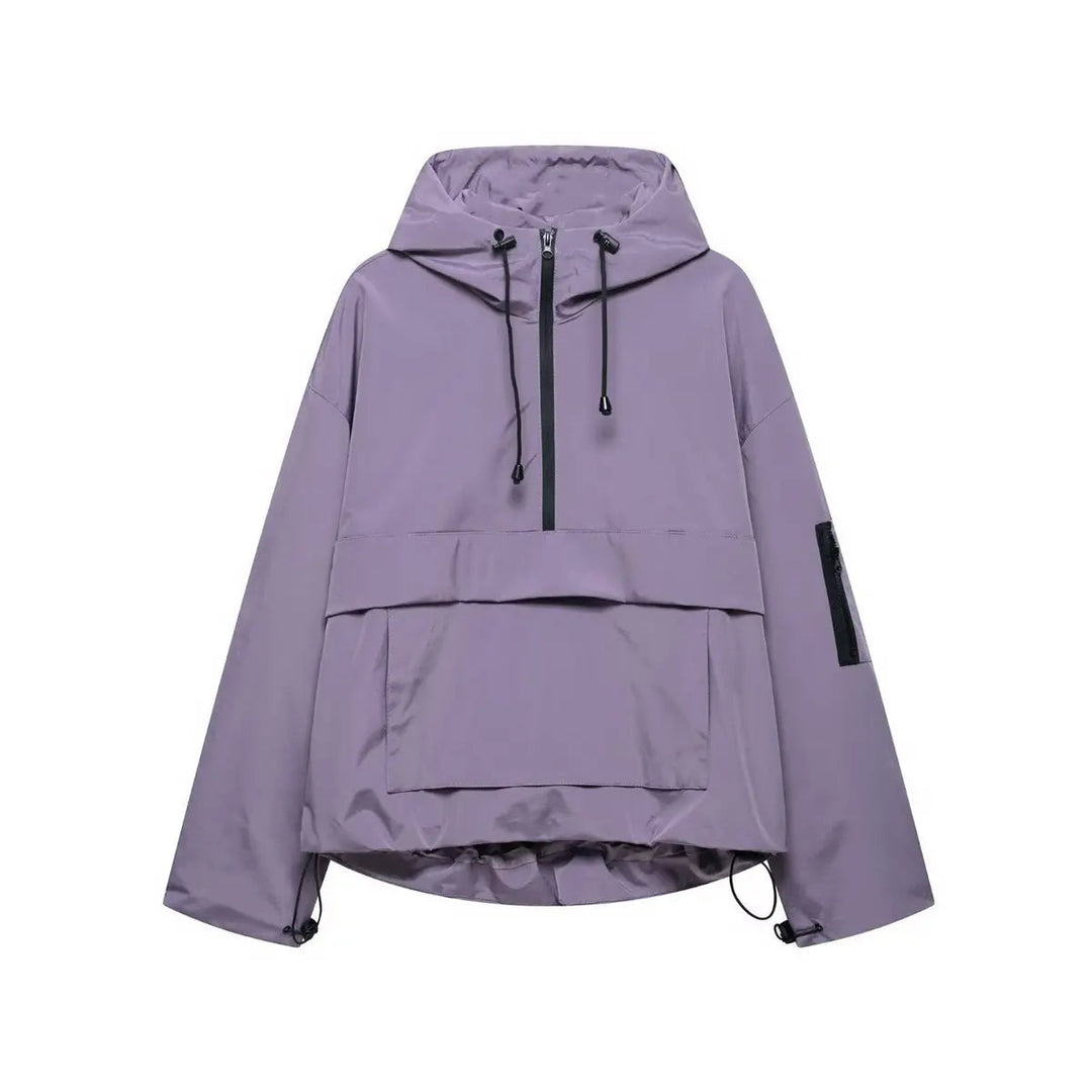 Stylish women's oversized windproof quilted anorak with hood. Ideal casual outerwear for weather-resistant fall fashion.