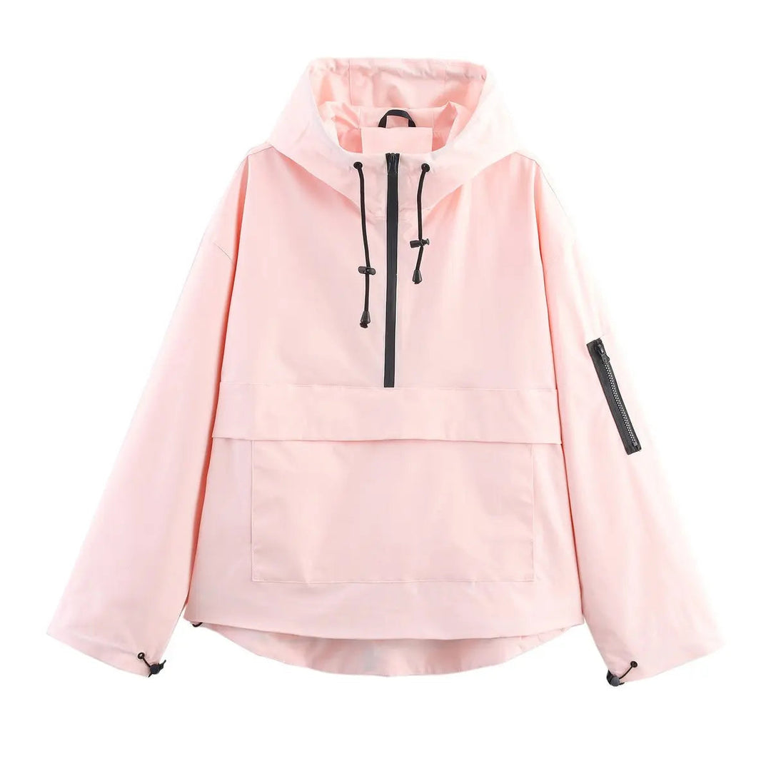 Textured quilted women's anorak pullover jacket. Hooded, windproof, & oversized design for comfortable fall & spring style.