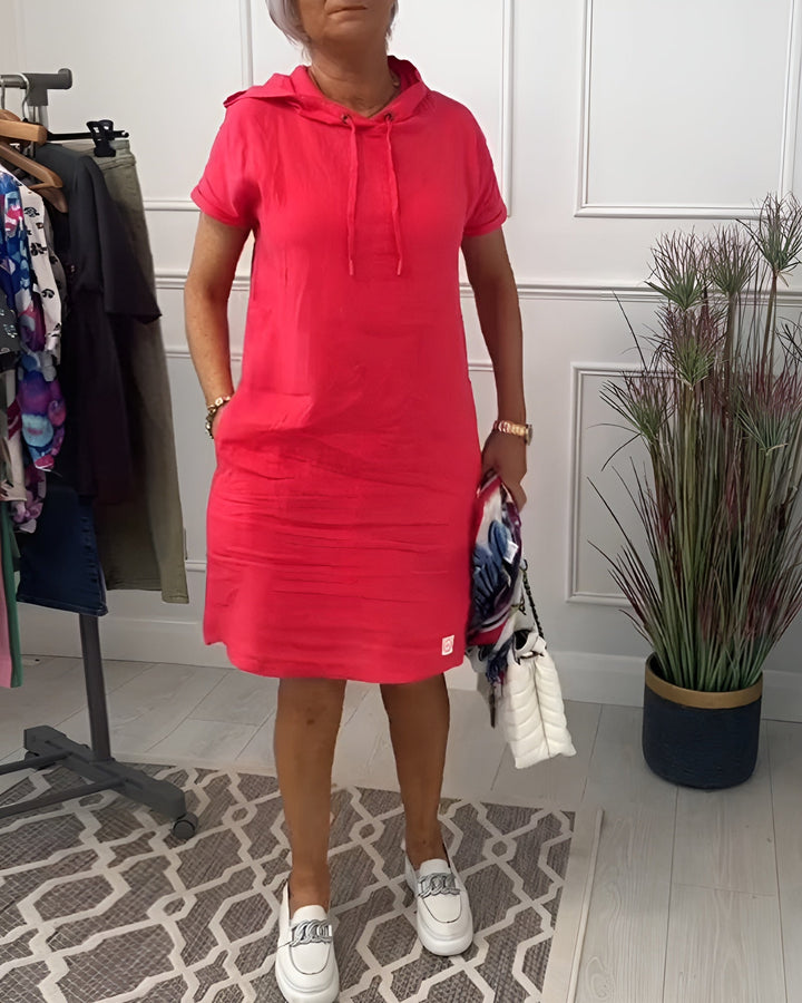 Women's hooded short sleeve dress with pocket, knee-length for casual everyday wear.