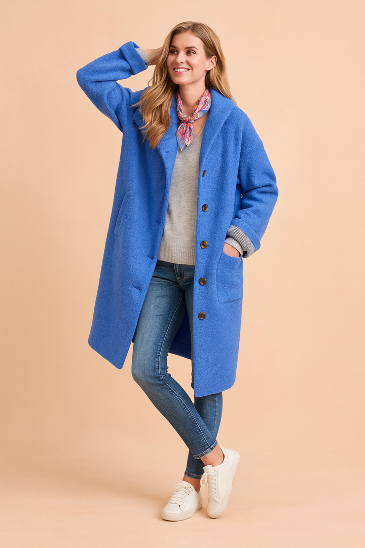 Close-up of the cozy hood on a fashionable women's winter coat, perfect for everyday wear.