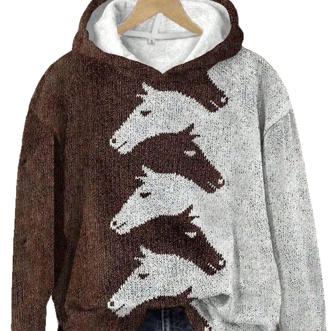 Close-up of a women's sweatshirt with a detailed horse pattern design, comfortable and chic.