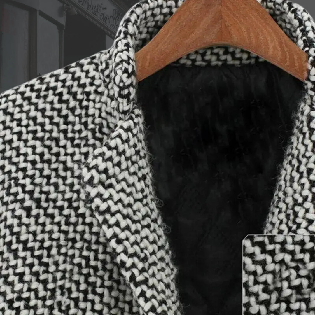 Elegant women's houndstooth trench coat. Stylish single-button winter outerwear for a sophisticated look.