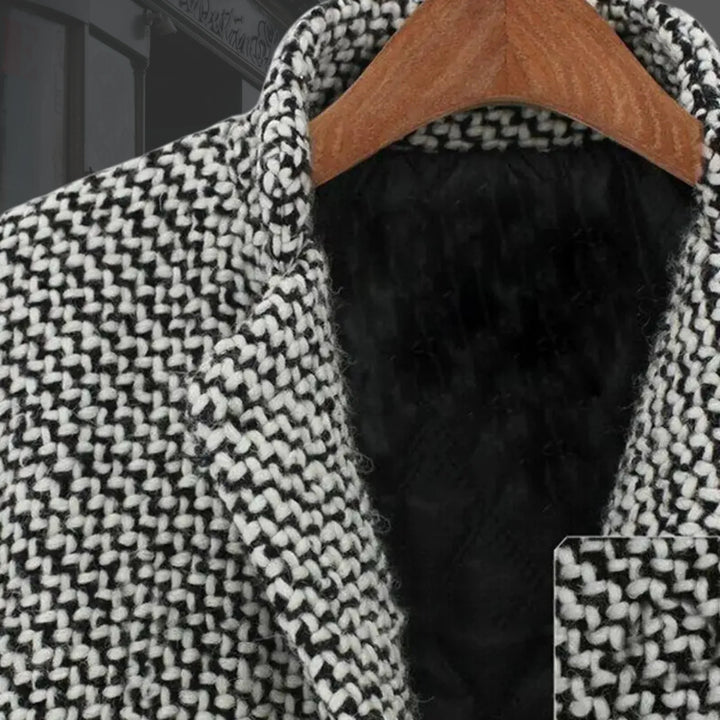Elegant women's houndstooth trench coat. Stylish single-button winter outerwear for a sophisticated look.