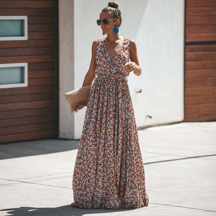 Elegant red floral V-neck maxi dress for women, sleeveless, comfortable and flowing, perfect for summer.