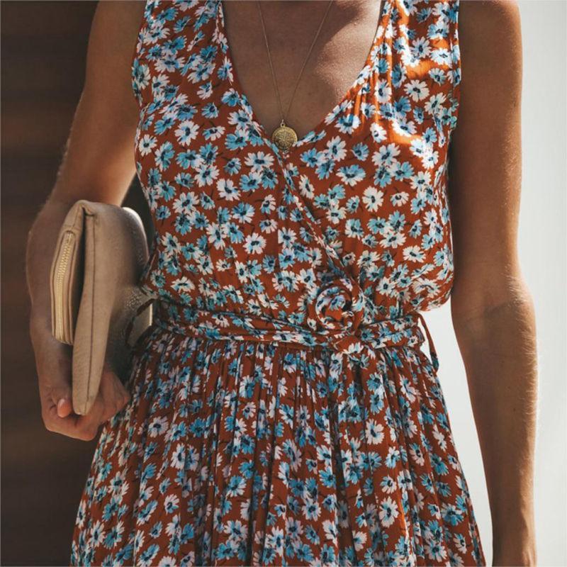Vibrant red floral print maxi dress for women, sleeveless V-neck, flowing and comfortable, ideal for holidays.
