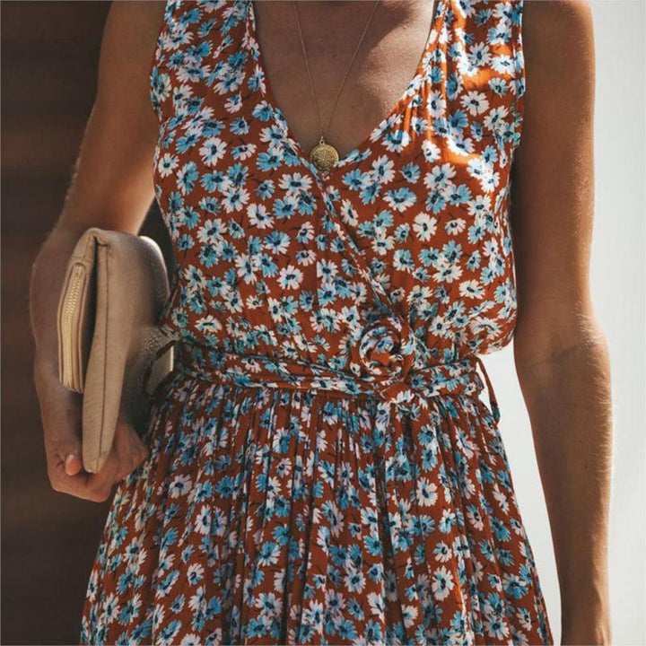 Vibrant red floral print maxi dress for women, sleeveless V-neck, flowing and comfortable, ideal for holidays.