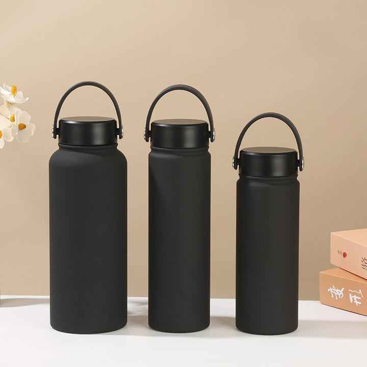 Stay hydrated with this women's insulated water bottle. Ergonomic handle, leak-proof, great for sport & gym.
