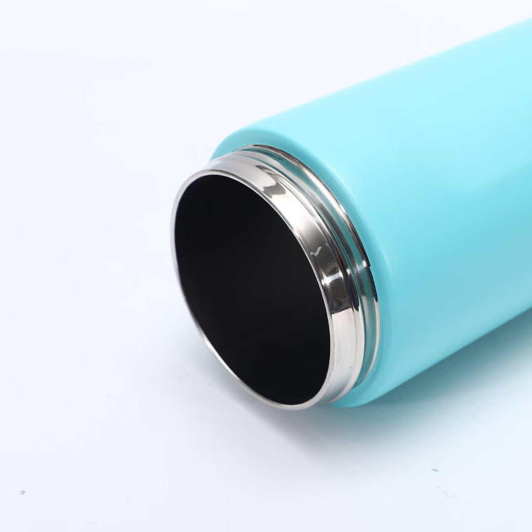Portable women's insulated bottle, perfect for travel, gym, or office. Keeps coffee hot, water cold.