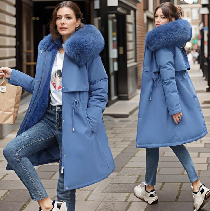Women's insulated winter parka with plush hood, waterproof for ultimate cold weather protection & style.