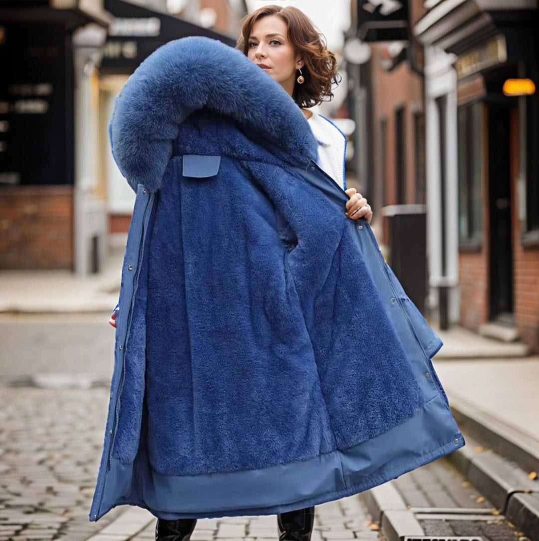 Stylish women's insulated parka, waterproof, keeping you warm & protected from cold winter weather. Side view.