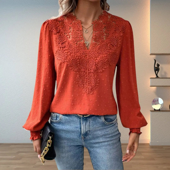 Women's intricate pattern blouse, long sleeve V-neck top with romantic lace detail & smocked cuffs.